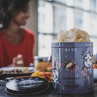 Bite Society Kennebec Sea Salt Potato chips are included in the Snack Magic Gift Basket. These tins of potato chips are adorned wiith American Traditional Flash Tattoo Skulls.