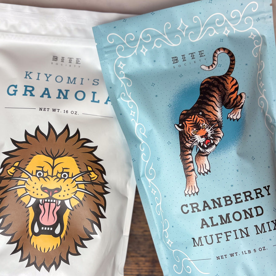 Bags of Kiyomi's Granola and Cranberry Almond Muffin Mix