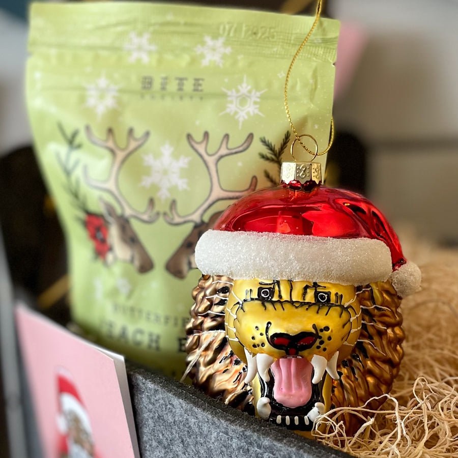 Our blown glass Bite Lion Christmas ornament