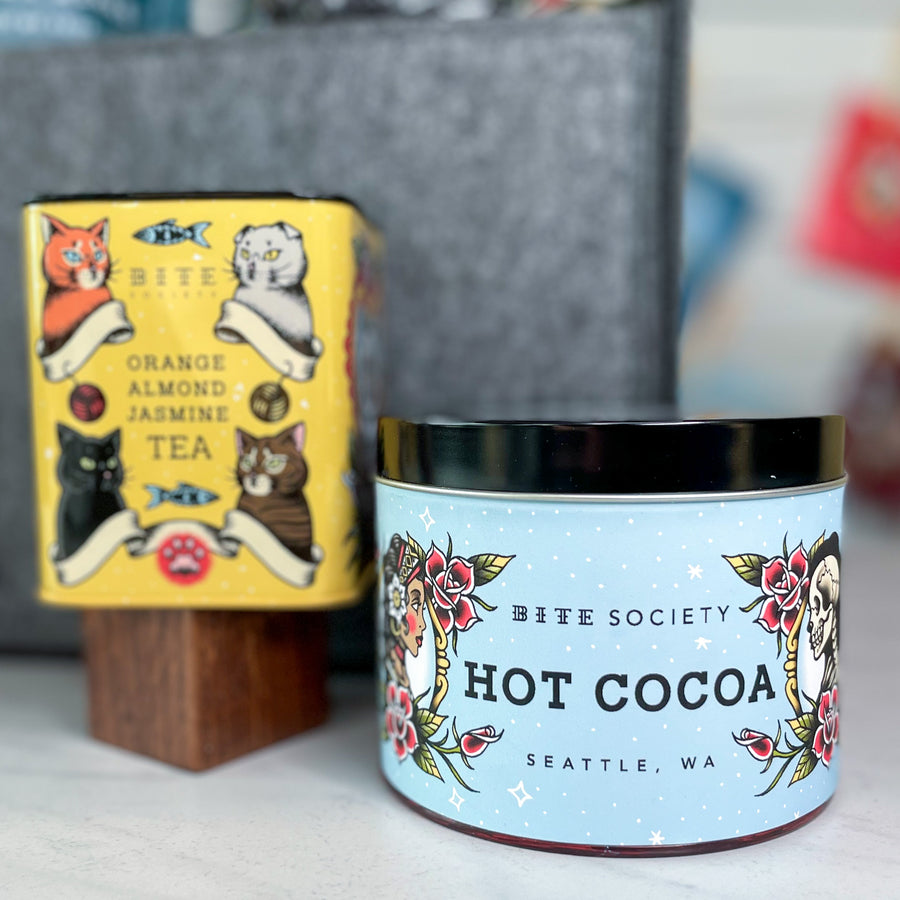 Bite Society Hot Cocoa and Orange Almond Jasmine Tea in the Cat Tin