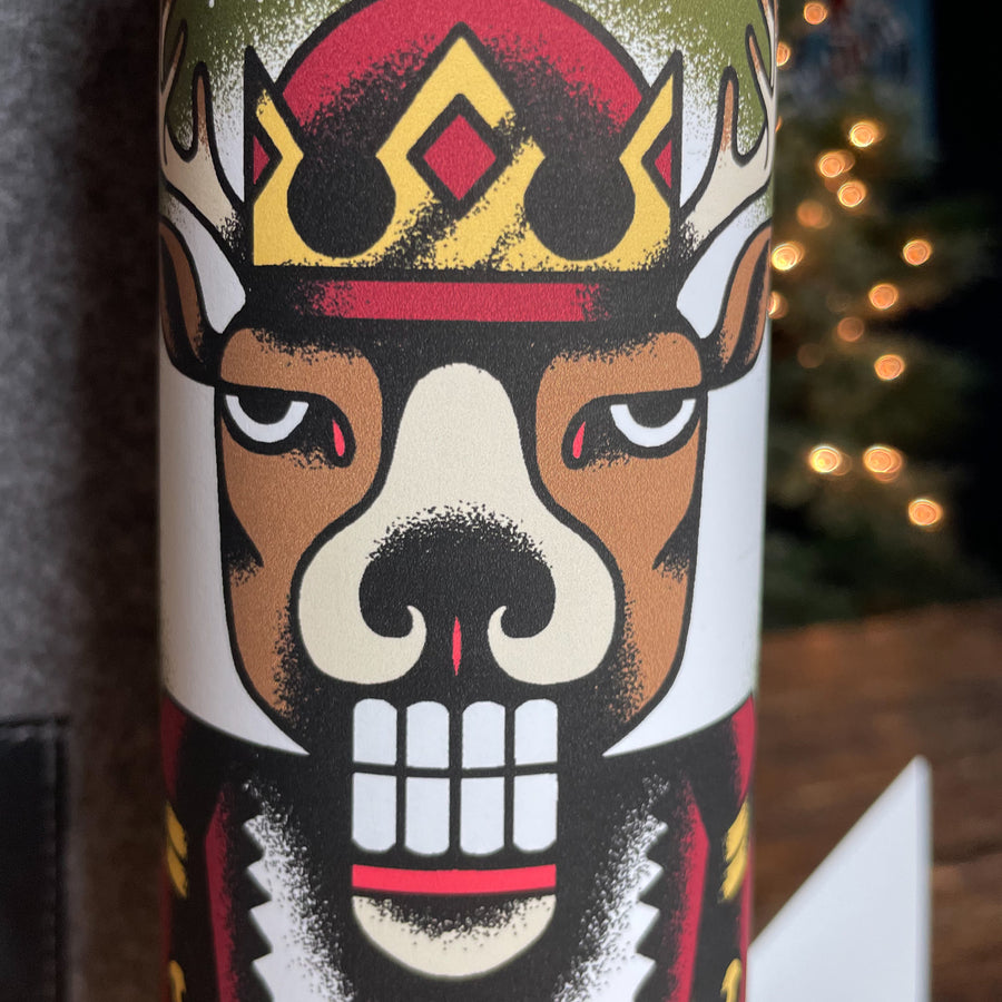 Hi There. I am a deer nutcracker tin with ginger snap cookies inside.