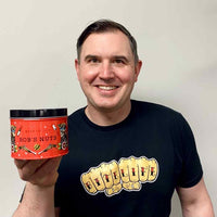 This is Bob Pennington holding his Bob's Spicy Nut Snack from Bite Society.